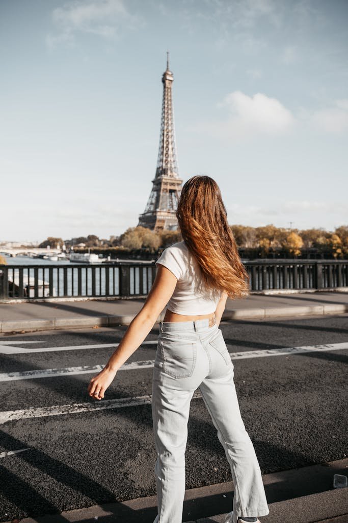 Woman on Bridge with Eiffel Tower in Background